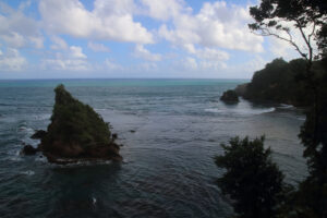 A rock stack in the bay off the Calibishie coast